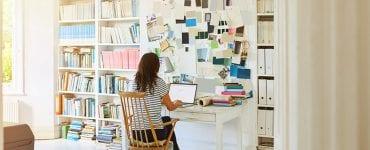Pregnant woman working at home - Stock image from iStock by Getty Images
