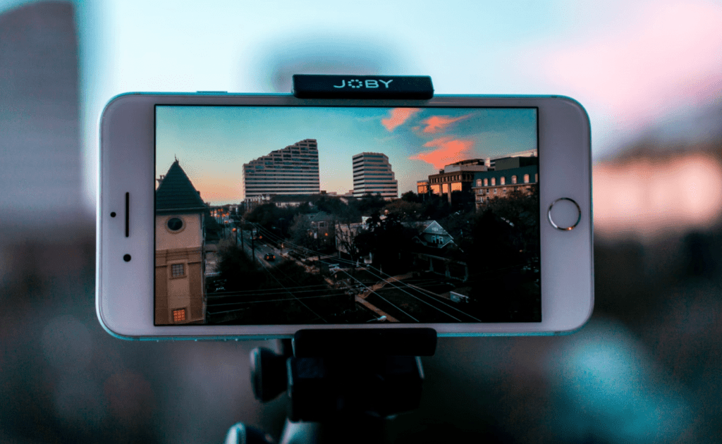 iphone on a tripod stand shooting footage of city for video portfolios