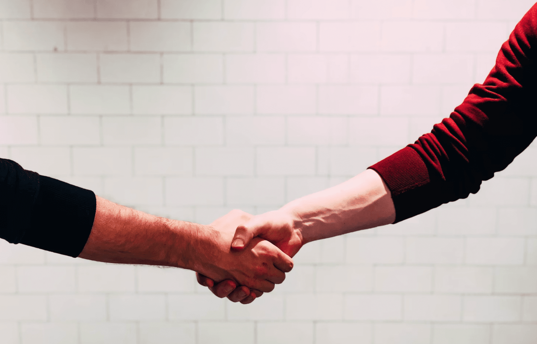 freelancer shaking hands with clients