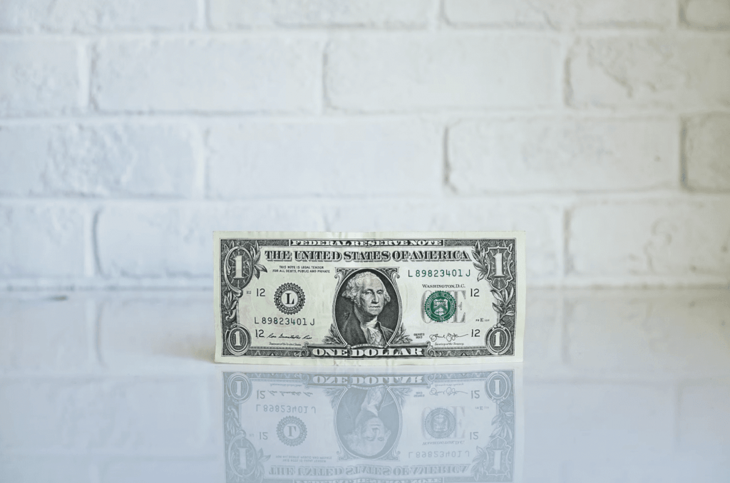 dollar bill on desk