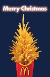 McDonalds ad - caption says 'Merry Christmas', with a picture of their fries shaped like a Christmas tree,