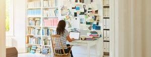 Pregnant woman working at home - Stock image from iStock by Getty Images