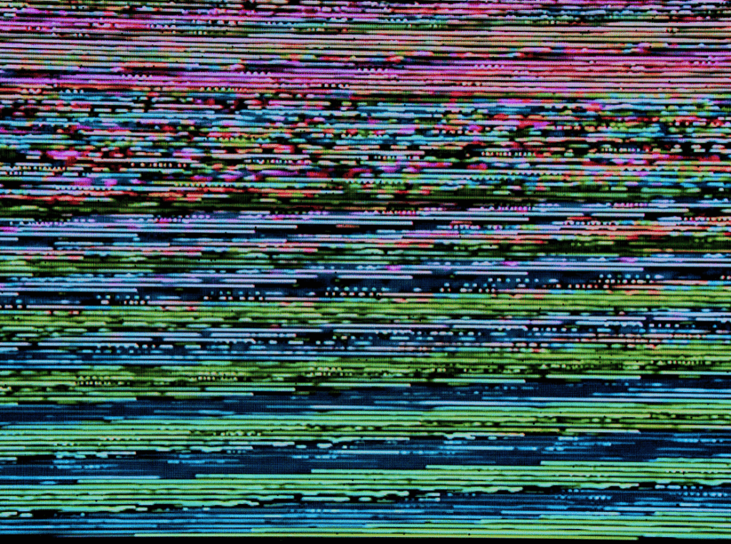 computer screen with pixelated colours on it